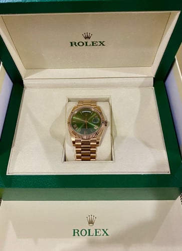 Rolex day date 40 mm rose gold