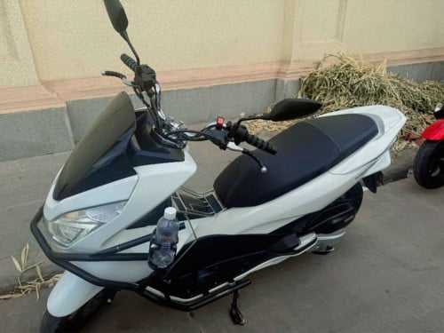 លក់ប្រញាប់ PCX 125 cc ជប៉ុន មានកាត មាសុីនថ្មីស្អាត អត់ដែររើ