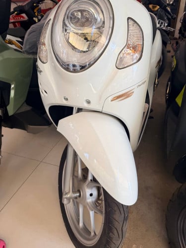 Honda scoopy មួយទឹក