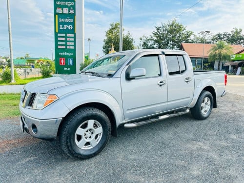 Nissan frontier ឆ្នាំ2005ប្រអប់លេខអូតូប៉ុងមួយសាំង+ហ្គាសបុិចឡានរៀបហេីយផ្លឹងមាញ៉េអេនដ្រយហេីយ