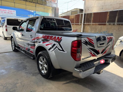 Nissan Navara 06 ម៉ាស៊ូតប៉ុង2អូតូកាពីតាស់ដំបូលបេីករំលស់សុត100%បាន