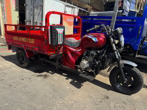 ម៉ូតូតូចកង់បីទ្រុងលាភមួយតឹក