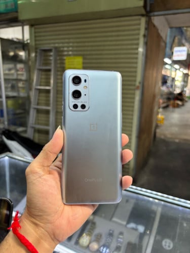 Oneplus9pro 256G Ram8G Sim2CH ឆ្នូតអេក្រង់ប្រើបាន