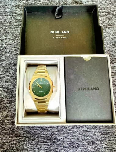 D1 Milano ladies gold green new 99% full box