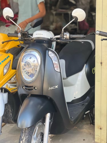 Honda Scoopy កង់តាន