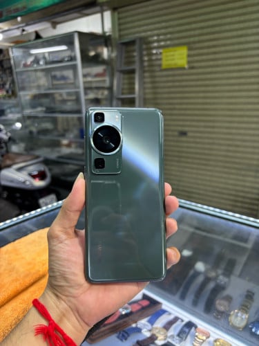 Huawei P60 128G Ram8G Sim2 CH ម៉ាសុីនស្រុីន អេក្រង់ស្រុីន