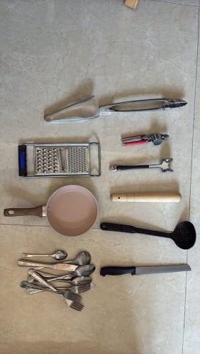 Various kitchen utensils, cups, bowls