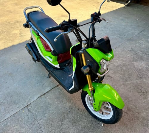 ម៉ូតូ ស្រណុំ