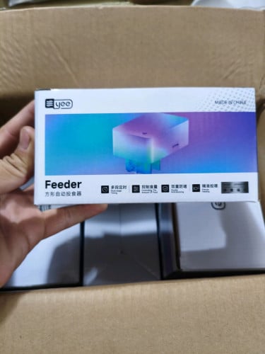 ម៉ាស៊ីនដាក់ចំណីអូតូ