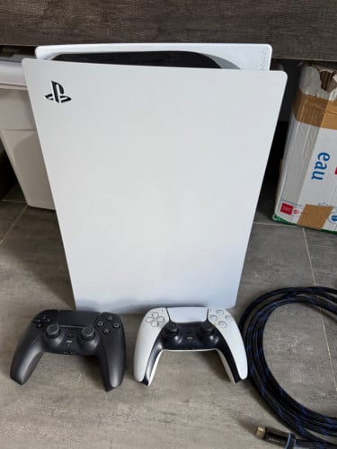 PlayStation 5 / PS5 with two controllers