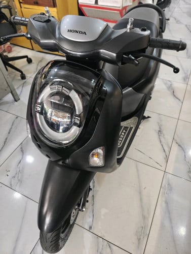 Honda Scopy 025  have tax plate number good 96%