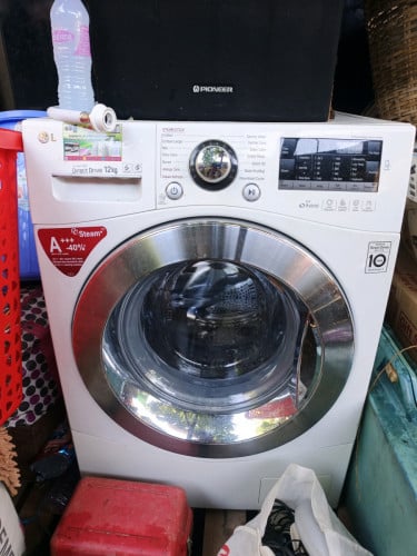 ម៉ាស៊ីនបោកគក់ខោអាវ ចំហៀងលក់