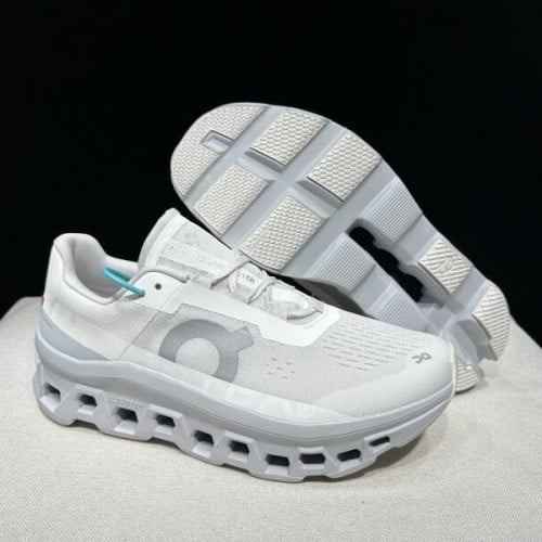 On Cloudmonster men and women running shoes