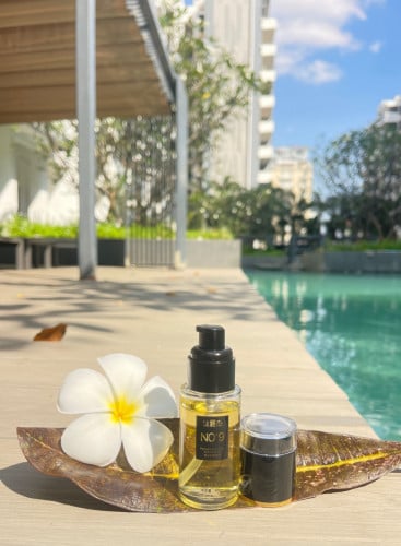 សេរ៉ូមលាបសក់ NO 9 Perfume Hair Care Essential Oil