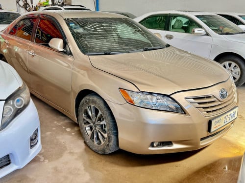ឡានលក់Camry ឆ្នាំ07 LE ព៉ោង9 ក្នុងលឿង កៅអីចុច មានABS និង ប្រពន័VSCទុបលំនឹង ពណ៌មាស