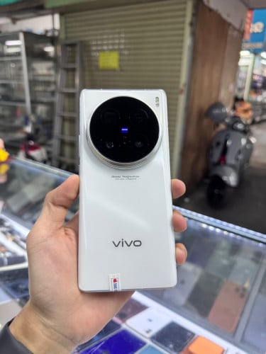 Vivo x100 Ultra Ram12 256G Sim2 CH ម៉ាសុីនស្រុីនដូរខ្នង