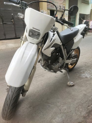 XR04 ព័ណសរ សុីន