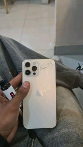 Iphone 12 promax 256GB LL/A zin all បែកថាច់បែកខ្នង់ក្រោយក្រៅពីនិងzin all ថាច់ស្មូតប្រេីរាល់ថ្ងៃ