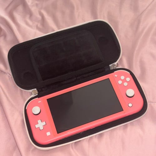 Nintendo Switch Lite - Coral JB have accessories