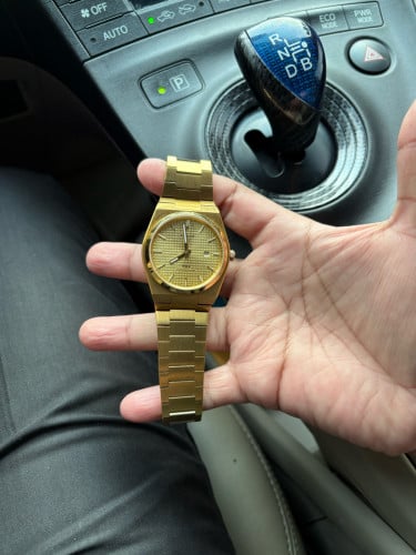 TISSOT gold(ទិញមកមិនទាន់ប្រើ)