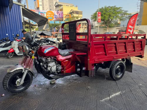 ម៉ូតូកង់បីមួយតឹកលក់