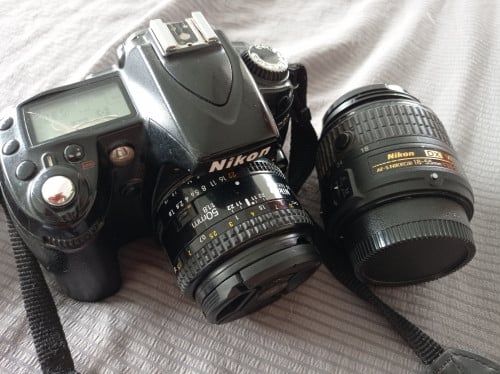 Nikon D90 (old but working well) + Nikkor 35 mm 1.8 + Nikon 18-55 mm