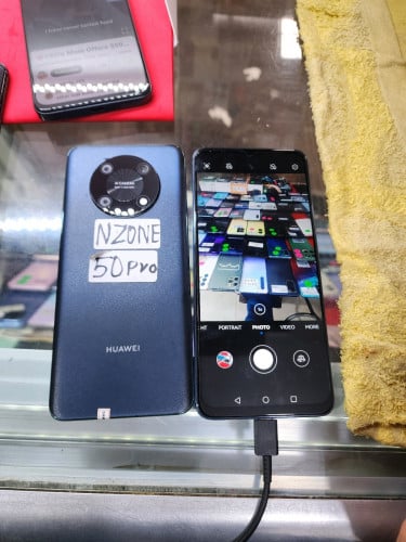 NzoNE  50pro128g8G 99%សីម2