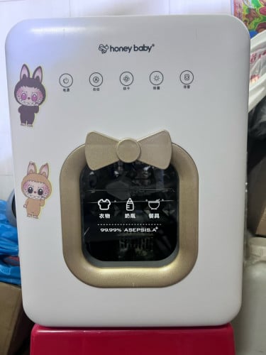 ម៉ាស៊ីនសម្ងួត និងសម្លាប់មេរោគដបទឹកដោះគោ និងសម្លៀកបំពាក់ទារក