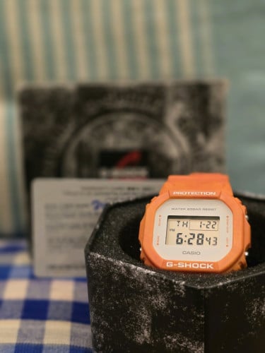 Casio G-Shock DW-5600WS-4 vivid orange digital watch.