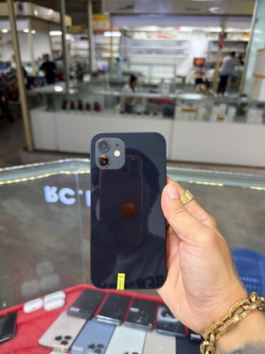 iPhone 12 Blue LL/A HD64GB Phone Condition 98% 🔋77% , ម៉ាស៊ីនសានុំ , មានស្កេនមុខ