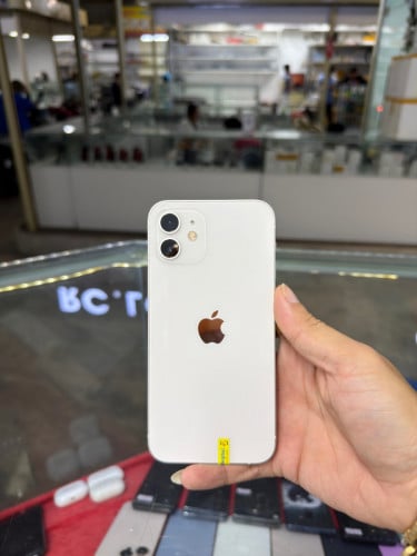 iPhone 12 white LL/A HD64GB Phone Condition 97% 🔋78% , ម៉ាស៊ីនសានុំ