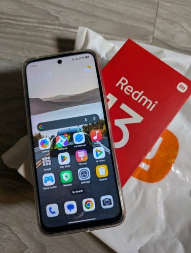 Redmi 13.  Pink color.