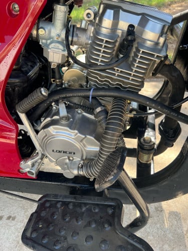 កង់បីនៅស្អាត់