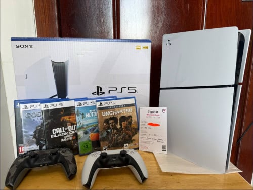 PS5 Slim disc drive edition 1T with 2controller and 5 disc game in warranty