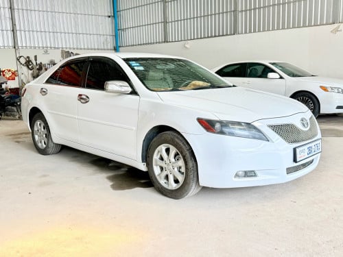 ឡានលក់Camry ឆ្នាំ07 LE ក្នុងលឿង ព៉ោង9 កៅអីចុច មានABS និង VSCទុបលំនឹង ក្នុងលឿង ពណ៌ស