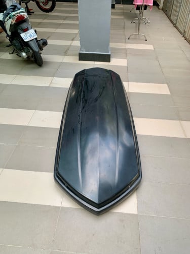 ប្រអប់់ដាក់អីវ៉ាន់លេីដំបូលឡាន