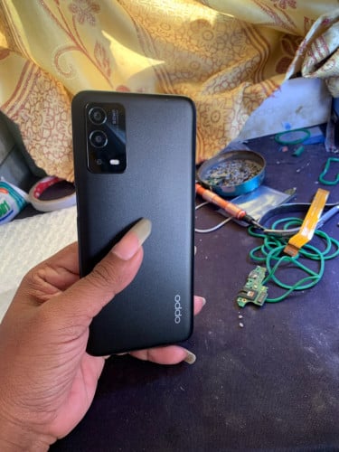 OPPO A55 ក្រុមហ៊ុន