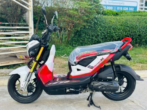 Honda Zoomer.X 018 ក្រុមហ៊ុន ម៉ាសុីនតាន់ហាប់នែនស្ងាត់ជិះស្រួលស្ទុះខ្លាំងមិនលាន់មិនហុយមានពន្ធកាតគ្រឺ