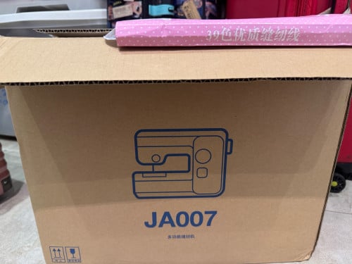 sewing machine ម៉ាស៊ីនដេរ 縫紉機 缝纫机