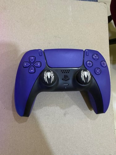 PS5 DualSense Wireless Controller in the Galactic Purple color variant (originals)