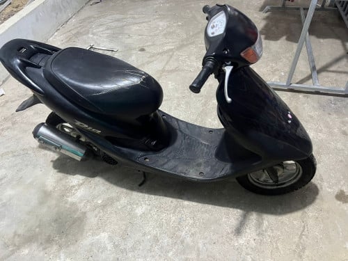 Want to sell honda dio just have plate number machine good