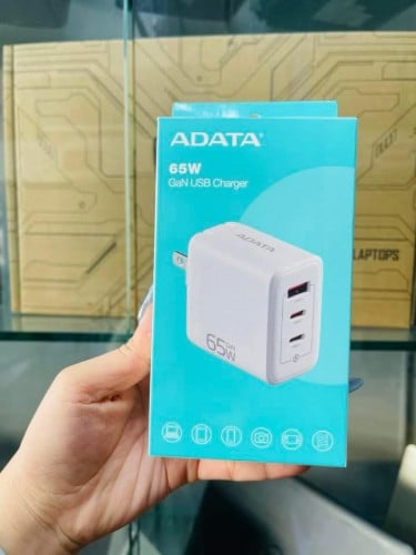 Charger Original Brand ADATA 65W មានការធានា1ឆ្នាំពេញ អីវ៉ាន់មាននៅក្នុងស្តុក បងអាចធ្វើការកម្ម៉ង់បាន📩