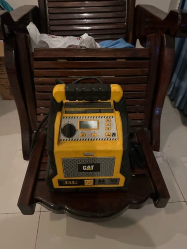 CAT ម៉ាសុីនសប់កង់និងកូវអាគុយ មួយទឹកអាគុយនៅកាន់ល្អ