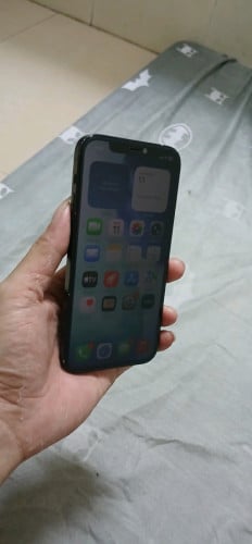 Iphone 12 ធម្មតាzin all អត់ស្គេនស្ទេីតួរcameraមុខក្រោយច្បាស់