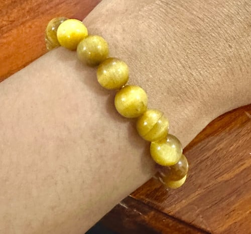 ខ្សែដៃអង្គាំធម្មជាតិ​ gold tiger eye