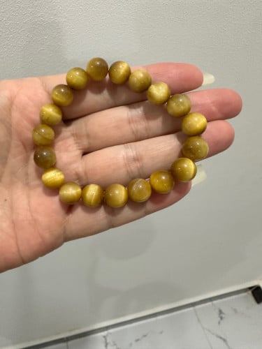ខ្សែដៃអង្គាំធម្មជាតិ​ gold tiger eye