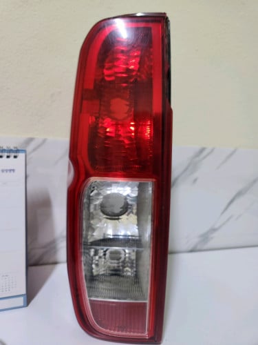 Nissan frontier tail light(left)