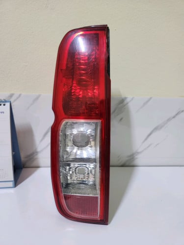 Nissan frontier tail light(left)