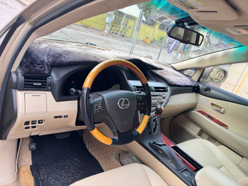 Lexus RX 350 year 2010 gold color very nice car