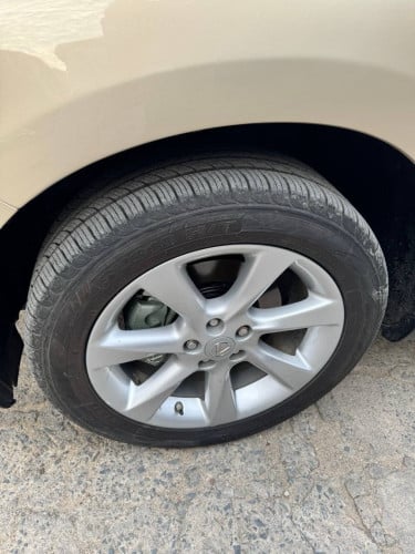Lexus RX 350 year 2010 gold color very nice car
